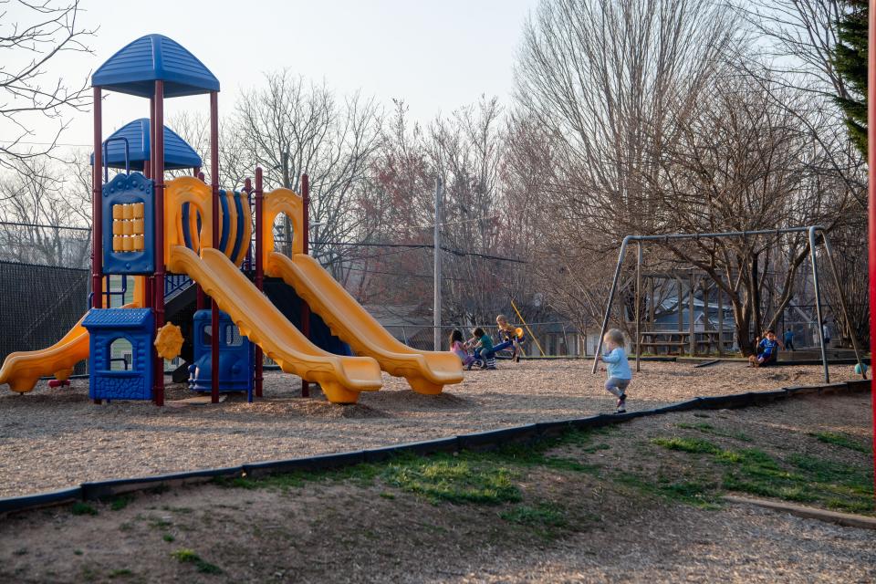 Children play on the playground at Lucy S. Herring Elementary.