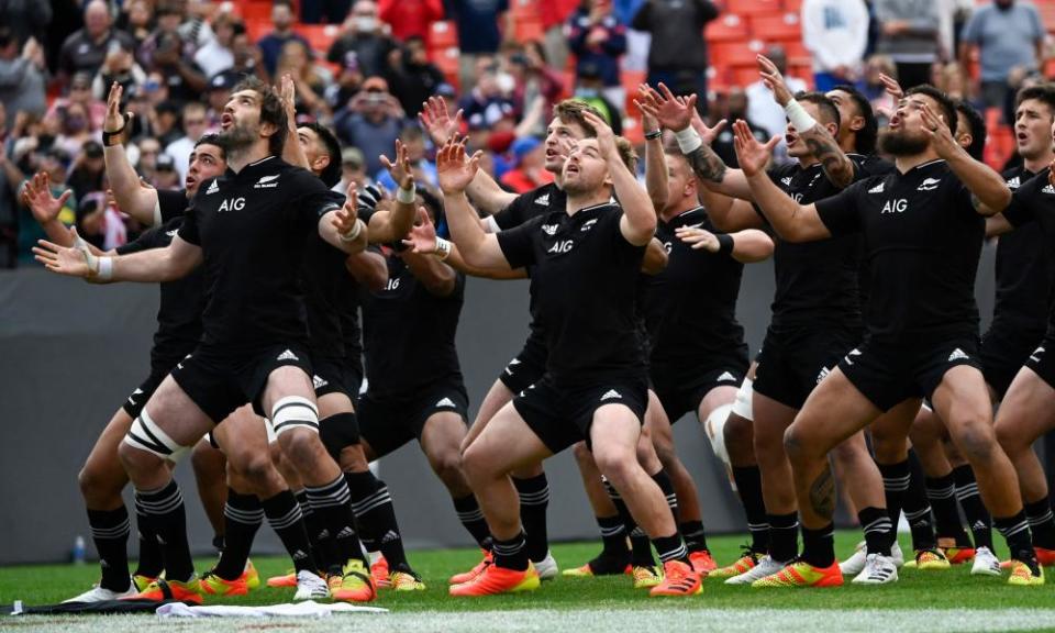 The All Blacks perform the Haka before their match against the USA