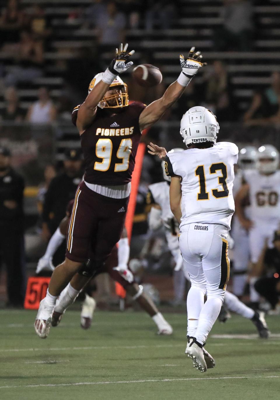 Simi Valley's Carson Mott knocks down a pass by Ventura's Joey Reynoso during the third quarter of the Pioneers’ 49-3 win in a season-opening game at Simi Valley High on Aug. 19, 2022.