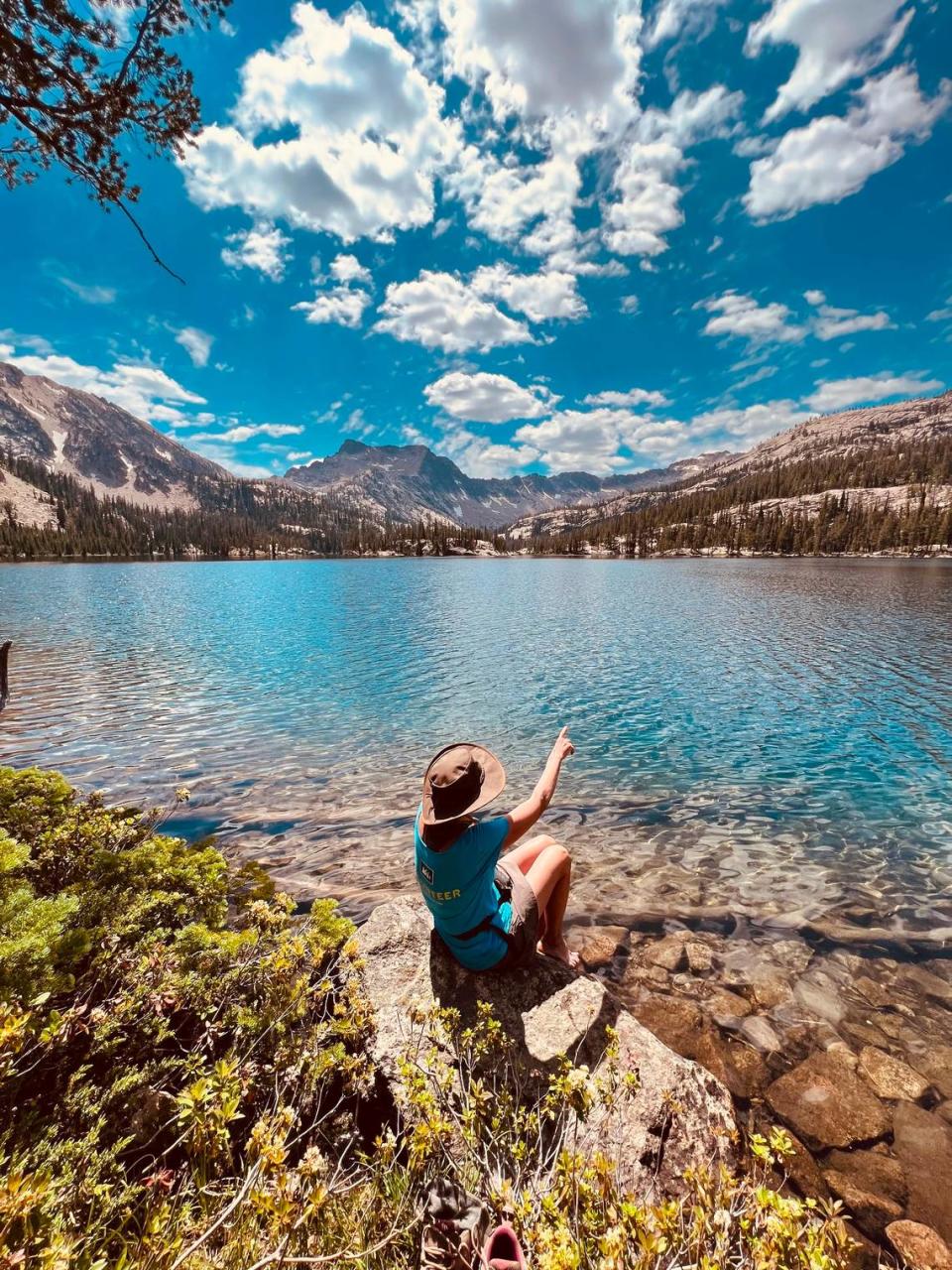 Danette Phelan sits on the shore of Imogene Lake. (Courtesy of Margaret McGranahan)