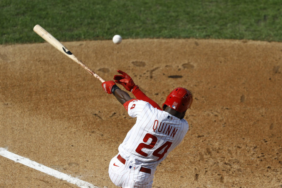 Philadelphia Phillies' Roman Quinn follows though after hitting a run scoring fielder's choice off New York Yankees' J.A. Happ during the third inning of the first baseball game in doubleheader, Wednesday, Aug. 5, 2020, in Philadelphia. (AP Photo/Matt Slocum)