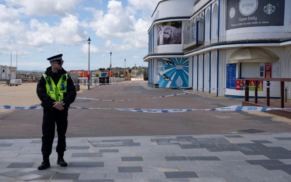 Police in Bournemouth cordon off an area of the beach on May 27, following Amie Gray's murder