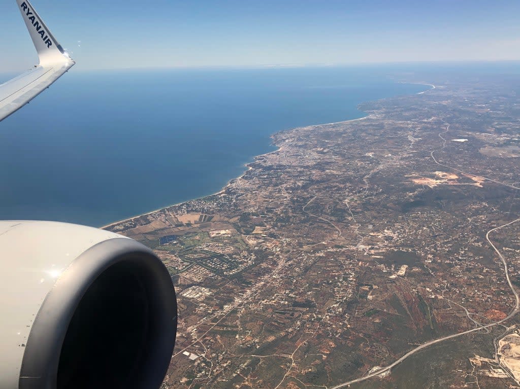 Danger zone: Boeing 737 flying over the Algarve coast in Portugal (Simon Calder)