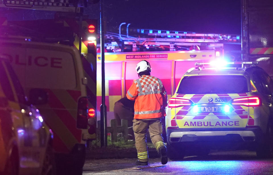 Emergency personnel at the scene in Babbs Mill Park in Kingshurst, Solihull. (PA)