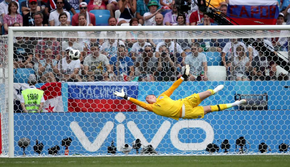 <p>Jordan Pickford takes to the air in a rare moment of action for the England keeper against Panama </p>