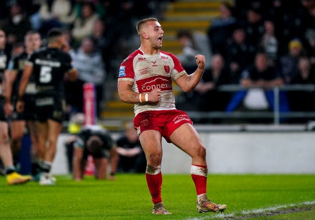 Man of the match Mikey Lewis celebrates after Matt Parcell's try