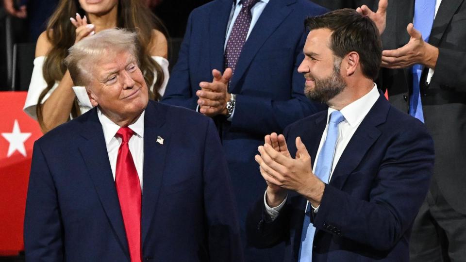 PHOTO: Former President Donald Trump and vice presidential candidate JD Vance appear on the first day of the Republican National Convention at the Fiserv Forum, July 15, 2024, in Milwaukee.  (Leon Neal/Getty Images)