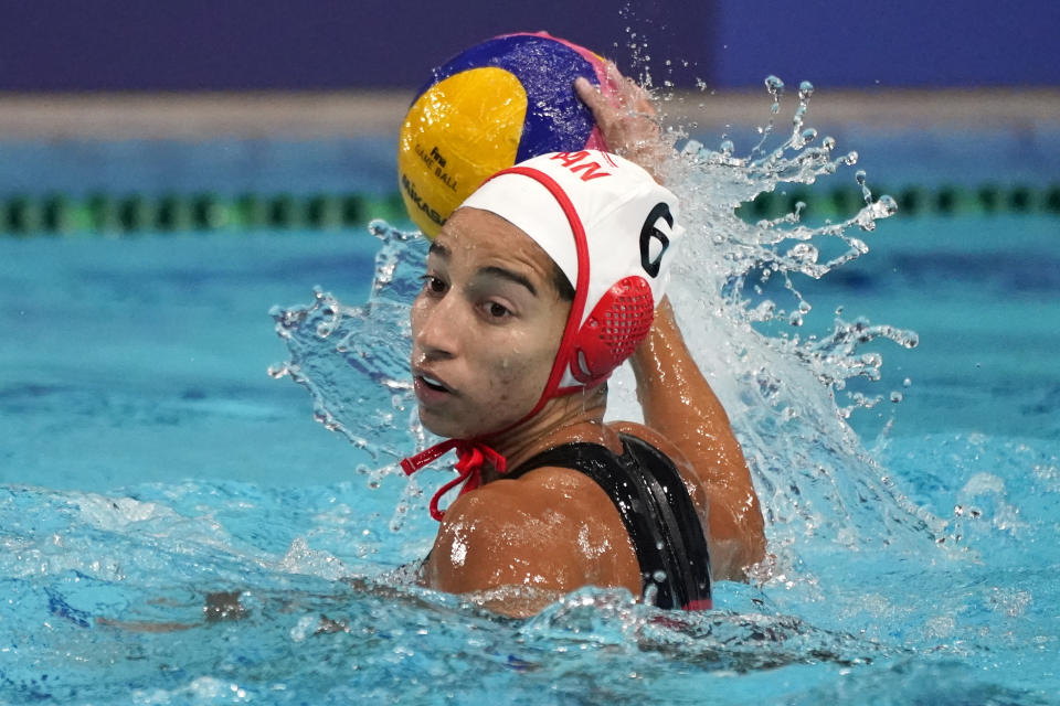 CORRECTS TO CANADA’S GURPREET SOHI PLAYING AGAINST SOUTH AFRICA - Canada’s Gurpreet Sohi plays against South Africa during a preliminary round women's water polo match at the 2020 Summer Olympics, Wednesday, July 28, 2021, in Tokyo, Japan. (AP Photo/Mark Humphrey)