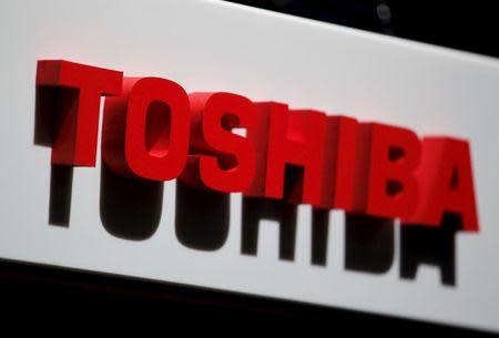 The logo of Toshiba Corp is seen at the company's news conference venue in Tokyo in this May 17, 2012 file photo. REUTERS/Yuriko Nakao/Files