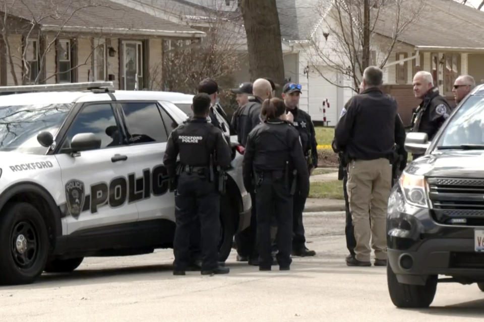 In this image taken from video provided by WTVO-TV/WQRF-TV/NewsNation. law enforcement personnel work at the scene, Wednesday, March 27, 2024, in Rockford, Ill., where four people were killed and five were wounded in stabbings in northern Illinois. Redd said that a suspect is in police custody and was being questioned. She said police did not know the motive. (WTVO-TV/WQRF-TV/NewsNation via AP)