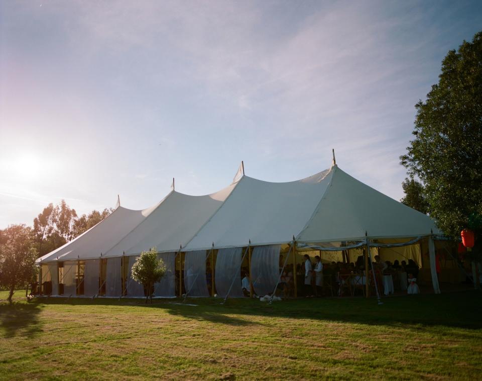 We had a traditional white canvas pole marquee erected next to the house, in which to host our wedding breakfast.