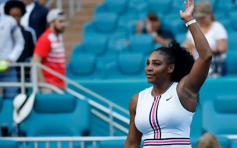 Serena Williams of the United States waves to the crowd after her match against Rebecca Peterson of Sweden (not pictured) in the second round of the Miami Open at Miami Open Tennis Complex - Credit: USA TODAY Sports