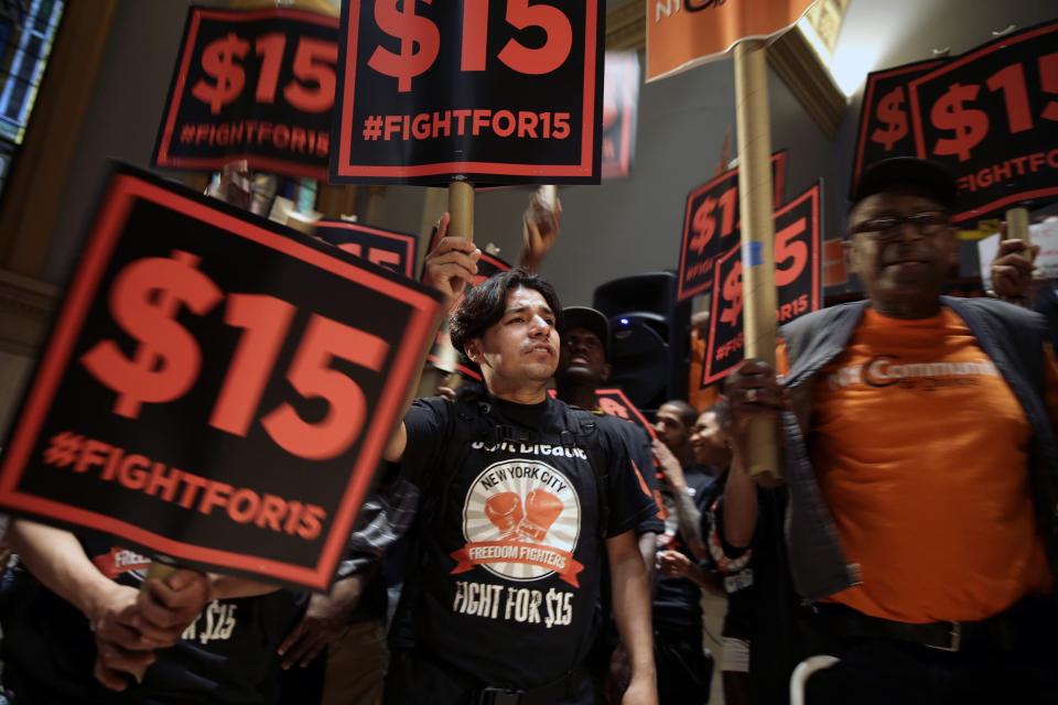 Minimum wage workers in Westchester County and on Long Island will see a $15 minimum hourly wage in 2022, while those in the rest of the state (excluding New York City) will go up to $13.20 an hour. In this 2015 photo, demonstrators rally for a $15 minimum wage before a meeting of then-Gov. Andrew Cuomo's wage board in New York.
