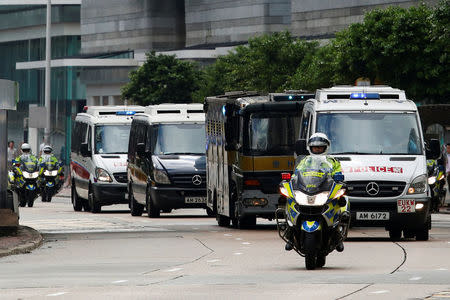 A motorcade taking British former banker Rurik Jutting to High Court in Hong Kong, China October 24, 2016. REUTERS/Bobby Yip