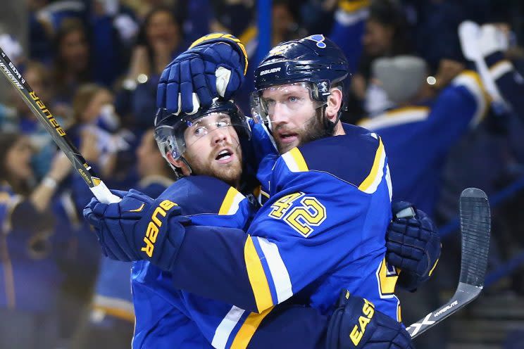 ST LOUIS, MO - MAY 15: David Backes #42 of the St. Louis Blues (R) celebrates with Jaden Schwartz #17 after scoring a first period goal against Martin Jones #31 of the San Jose Sharks (not pictured) in Game One of the Western Conference Final during the 2016 NHL Stanley Cup Playoffs at Scottrade Center on May 15, 2016 in St Louis, Missouri. (Photo by Dilip Vishwanat/Getty Images)