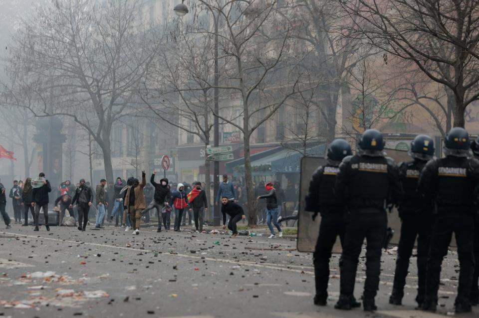 Demonstrators clash with police in central Paris (AP)