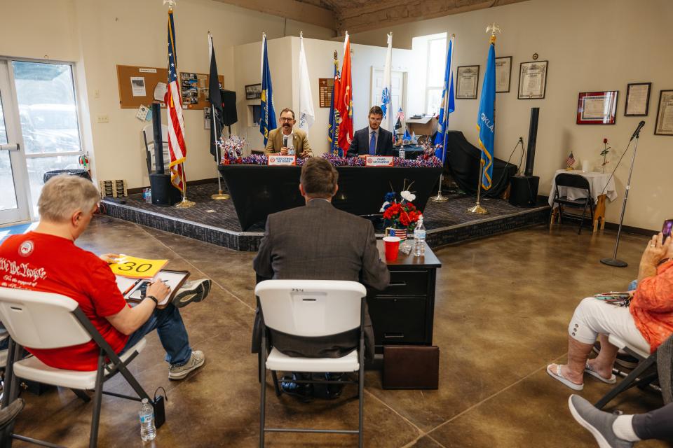 (left to right) Oklahoma State Rep Judd Strom and challenger Chad McCarthy answer questions during a form held by the WCGOP on June 10, 2024.