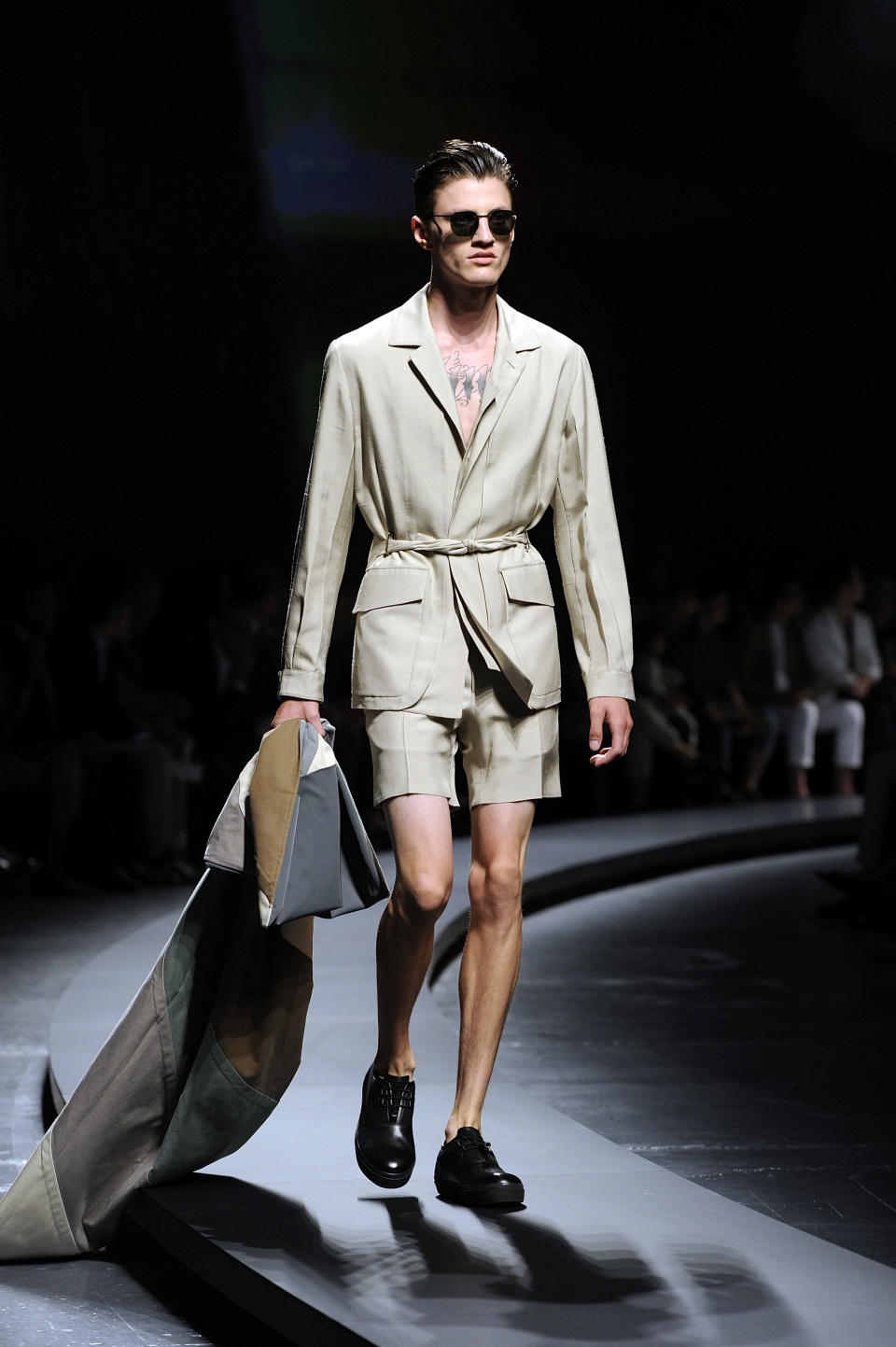 A model wears a creation for Ermenegildo Zegna men's Spring-Summer 2014 collection, part of the Milan Fashion Week, unveiled in Milan, Italy, Saturday, June 22, 2013. (AP Photo/Giuseppe Aresu)