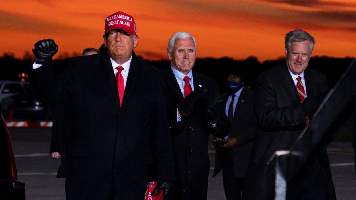 Mandatory Credit: Photo by Evan Vucci/AP/Shutterstock (11006047a)President Donald Trump and Vice President Mike Pence arrive for a campaign rally at Cherry Capital Airport, in Traverse City, Mich.