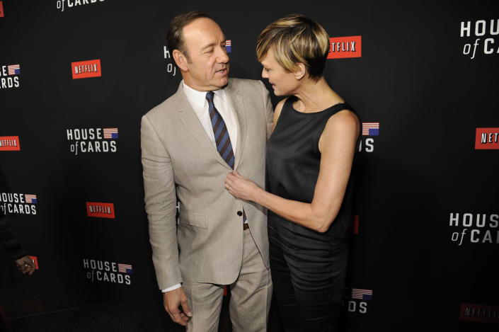 Kevin Spacey, left, and Robin Wright arrive at a special screening for season 2 of "House of Cards", on Thursday, Feb. 13, 2014 in Los Angeles. (Photo by Chris Pizzello/Invision/AP)