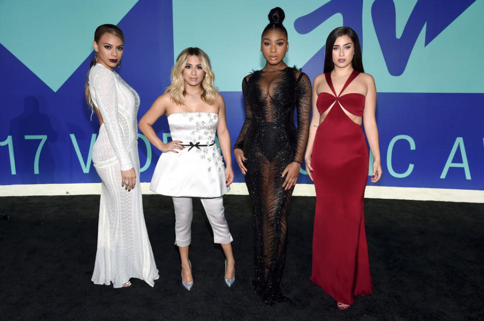 <p>The four members of Fifth Harmony — Dinah Jane, Ally Brooke, Normani Kordei, and Lauren Jauregui — opted not to coordinate their looks. (Photo: Getty Images) </p>