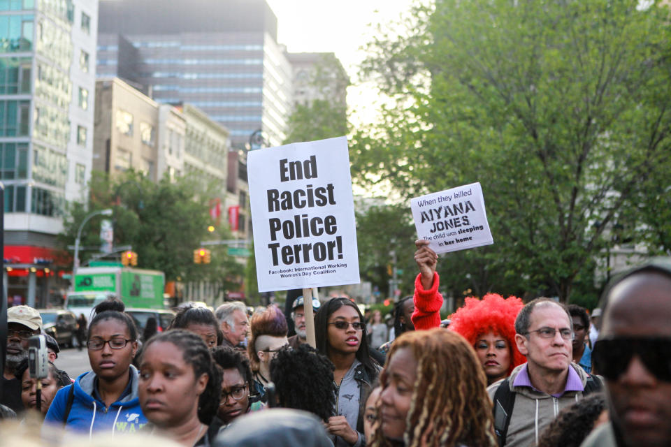 "End Racist Police Terror!"