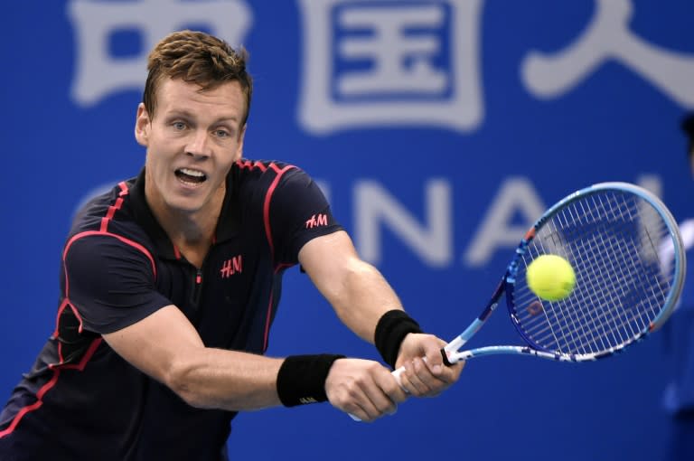 Tomas Berdych of the Czech Republic in action against Pablo Cuevas of Uruguay during their first-round match at the China Open in Beijing on October 7, 2015