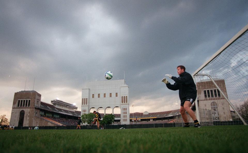 Columbus Crew goal keeper Brad Friedel warms up outside Ohio Stadium before an exhibition match against Leeds United of the English Premier League in 1997.