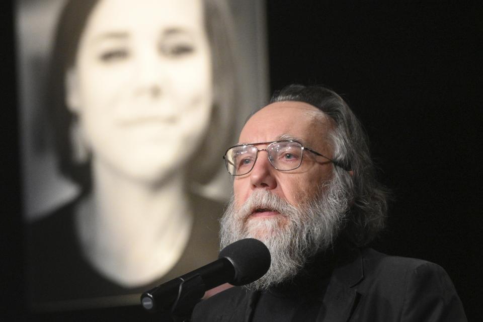 FILE – Russian nationalist Alexander Dugin speaks at a memorial service on Tuesday, Aug. 23, 2022, for his daughter Daria Dugina, a 29-year-old commentator for a Russian TV channel, who died in a car bombing in 2022 near Moscow. He has argued that the Kremlin should respond to recent Ukrainian attacks inside Russia by escalating the fighting and declaring a broad mobilization. (AP Photo/Dmitry Serebryakov, File)