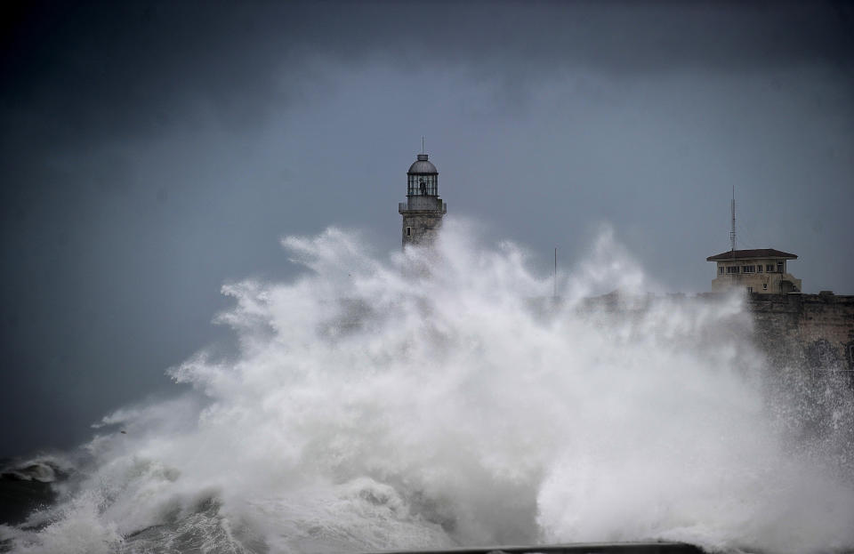 <p>A huge wave breaks near the Morro Castle in Havana, on Sept. 10, 2017. (Photo: Yamil Lage/AFP/Getty Images) </p>