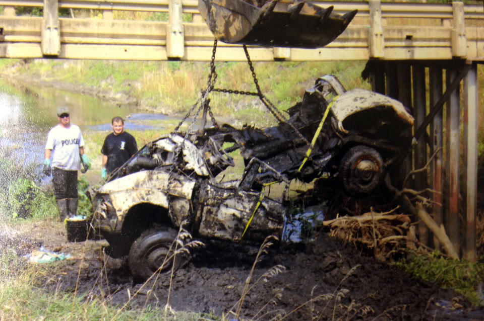 In this September 2013 photo provided by the South Dakota Attorney Generals Office a 1960 Studebaker is lifted from Brule Creek near Alcester, S.D. next to a gravel pit Cheryl Miller and Pamella Jackson were driving to for a gathering with classmates to celebrate the end of the school year in 1971. The 17-year-old girls weren’t known for frequenting parties, so when they didn’t show up, other teens just assumed they had changed plans. Their disappearance baffled investigators for decades. Now the 43-year-old mystery has been solved and authorities confirmed on April 15, 2014 the girls remains were found in the car. (AP Photo/South Dakota Attorney Generals Office)