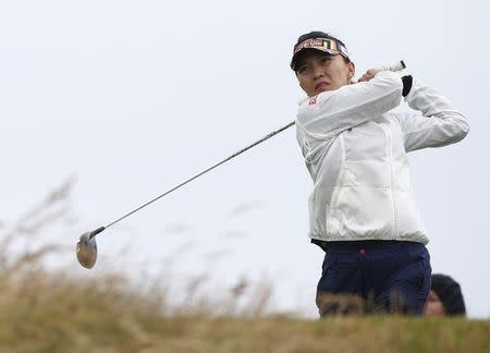 Taiwan's Teresa Lu watches her tee shot on the 13th hole during the second round. Action Images via Reuters / Russell Cheyne