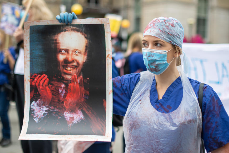 NHS staff and supporters take part in a protest march in central London, as part of a series of marches and rallies form across the country calling for a 15% pay rise for NHS workers and an increase in NHS funding. (Photo by Dominic Lipinski/PA Images via Getty Images)