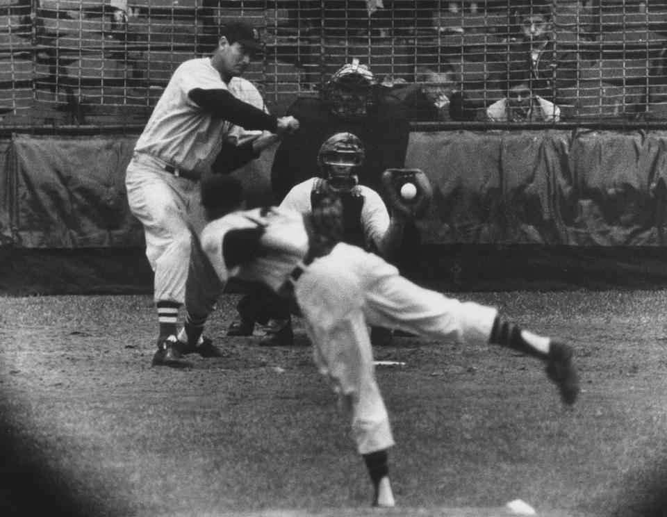 Jim Bunning #14 of the Detroit Tigers delivers the pitch to Ted Williams #9 of the Boston Red Sox during a 1957 season game at Briggs Stadium in Detroit, Michigan. (Photo by Frank Scherschel/The LIFE Picture Collection via Getty Images)