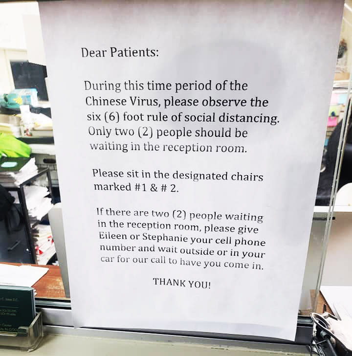 The sign at the chiropractor's office in Jersey City. (Annesia Paraison / via Facebook)