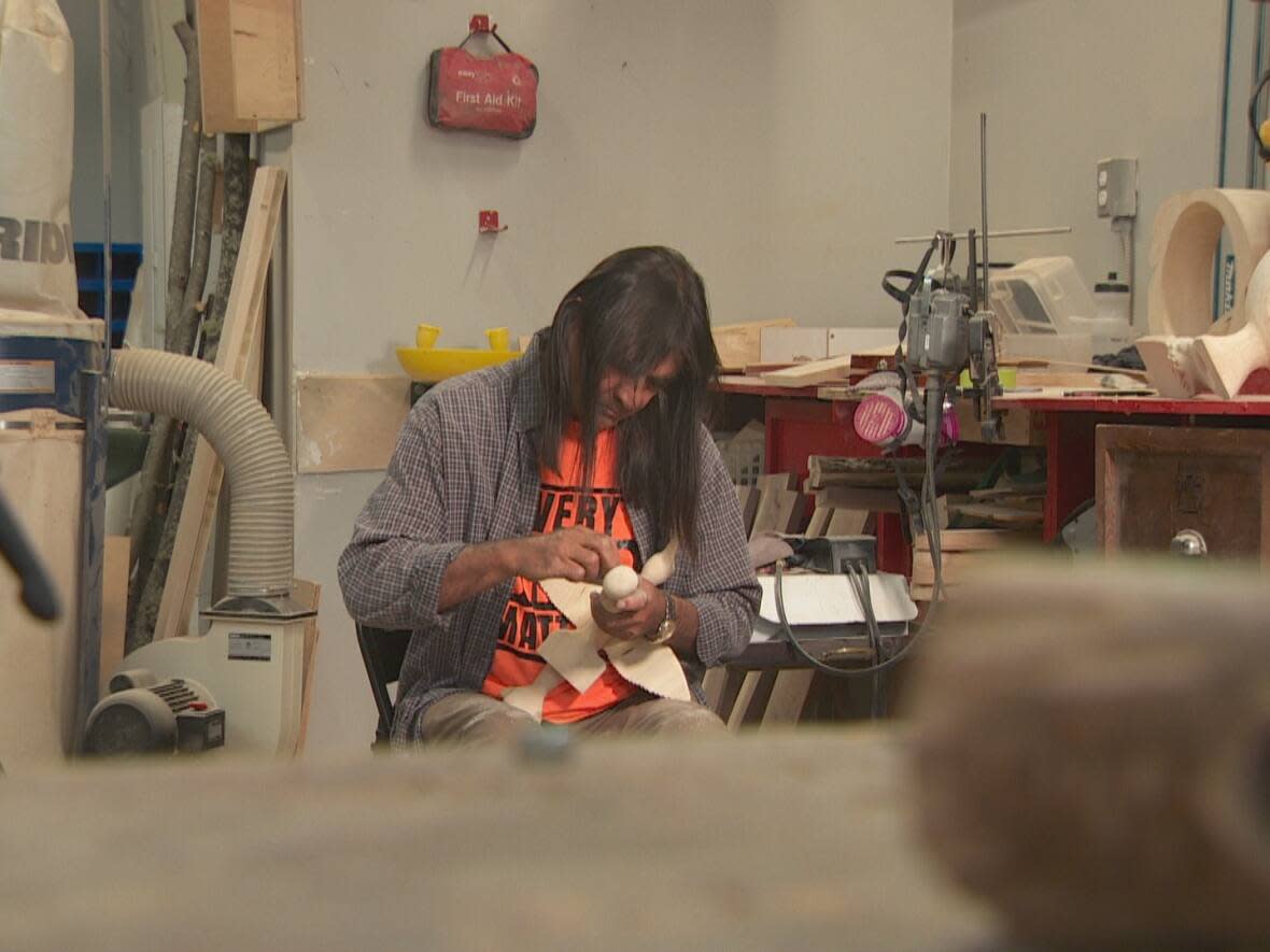 Chi Mokaman in the Saint John Tool Library. He said the space has everything that allows him to be himself. (Mike Heenan/CBC - image credit)