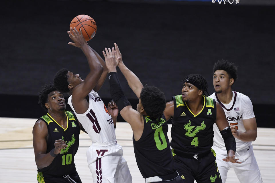 Virginia Tech's Nahiem Alleyne shoots against South Florida in the second half of an NCAA college basketball game, Sunday, Nov. 29, 2020, in Uncasville, Conn. (AP Photo/Jessica Hill)