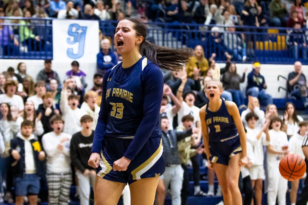 New Prairie's Morgan White (33) celebrates during the New Prairie vs. Jimtown girls sectional semifinal basketball game Friday, Feb. 2, 2024 at New Prairie High School.