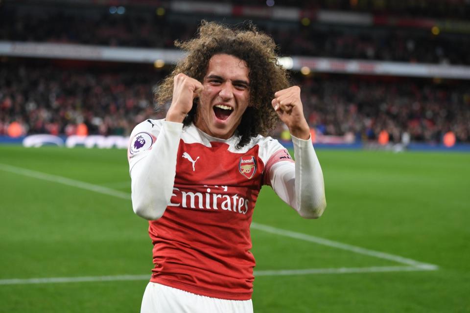 Arsenal man Matteo Guendouzi celebrates in car with jubilant fans after north London derby victory
