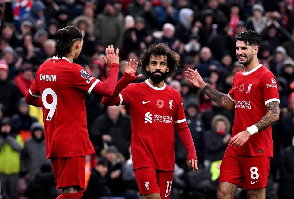 Darwin Nunez, Mohamed Salaha and Dominik Szoboszlai high five (Liverpool FC via Getty Images)