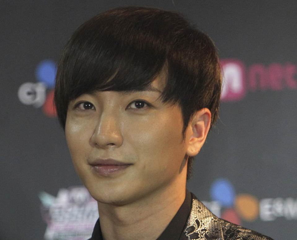FILE - In this Oct. 4, 2012 file photo, Lee Teuk, a member of South Korean boy band Super Junior, poses for photos ahead of their concert in Bangkok, Thailand. The Chosun Ilbo newspaper reported on its website Tuesday, Jan. 7, 2014, Lee's grandparents were found dead in bed while his father was hanging by a rope around his neck at their Seoul home Monday, Jan. 6. His father and grandparents died in a suspected murder-suicide. (AP Photo/Sakchai Lalit, File)