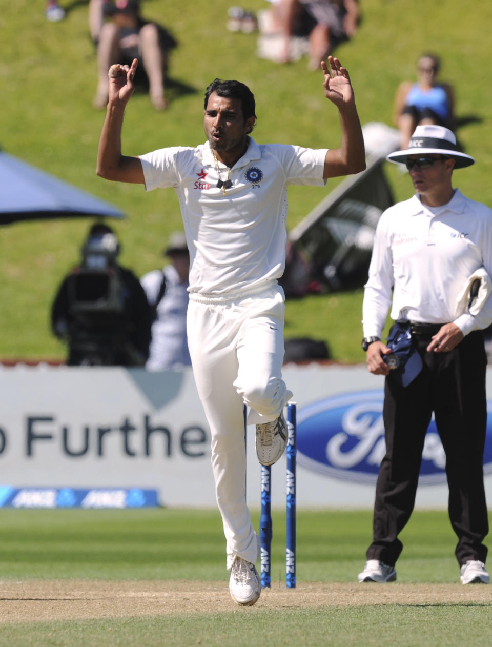 India’s Mohammed Shami reacts bowling against New Zealand on the fourth day of the second cricket test at Basin Reserve in Wellington, New Zealand, Monday, Feb. 17, 2014. (AP Photo/SNPA, Ross Setford) NEW ZEALAND OUT