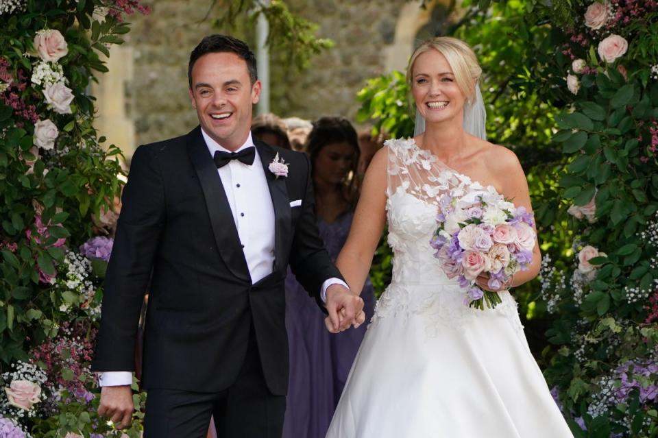 Anthony McPartlin and Anne-Marie Corbett leaving St Michael's church, Heckfield in Hampshire, after their wedding in 2021 (PA)