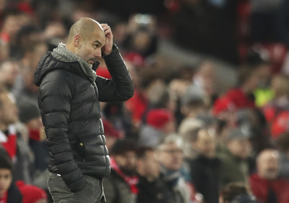 Manchester City's head coach Pep Guardiola gestures during the English Premier League soccer match between Liverpool and Manchester City at Anfield stadium in Liverpool, England, Sunday, Nov. 10, 2019. (AP Photo/Jon Super)