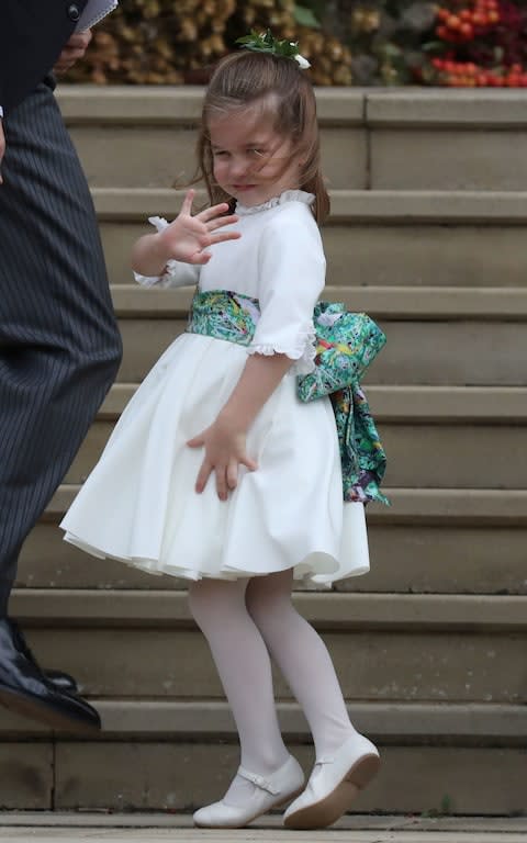 Princess Charlotte gives a wave - Credit: Steve Parsons/PA Wire