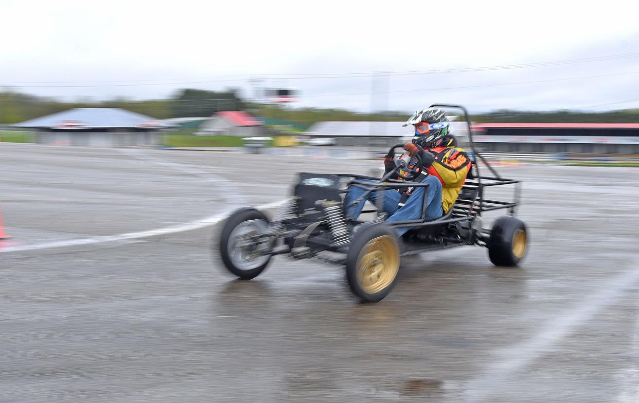 NCSC student Jackson Carpenter of Ashland speeds around the course Tuesday morning in a parking lot at the Mid-Ohio Sports Car Course.