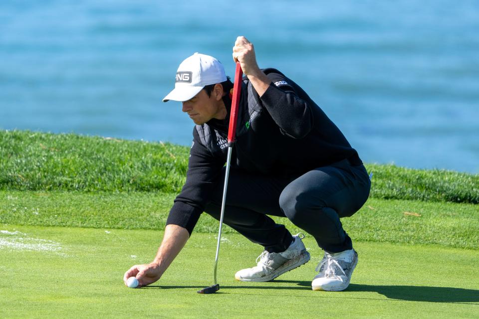 February 2, 2024; Pebble Beach, California, USA; Viktor Hovland lines up his putt on the fifth hole during the second round of the AT&T Pebble Beach Pro-Am golf tournament at Pebble Beach Golf Links. Mandatory Credit: Kyle Terada-USA TODAY Sports