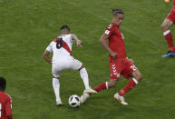 <p>Penalty! Christian Cueva is fouled by Yussuf Yurary Poulsen in the box to give Peru chance to take the lead. (AP) </p>