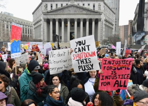Hundreds of protesters gathered for the Women's Unity Rally at Foley Square in New York City, while a breakaway group rallied elsewhere in the city