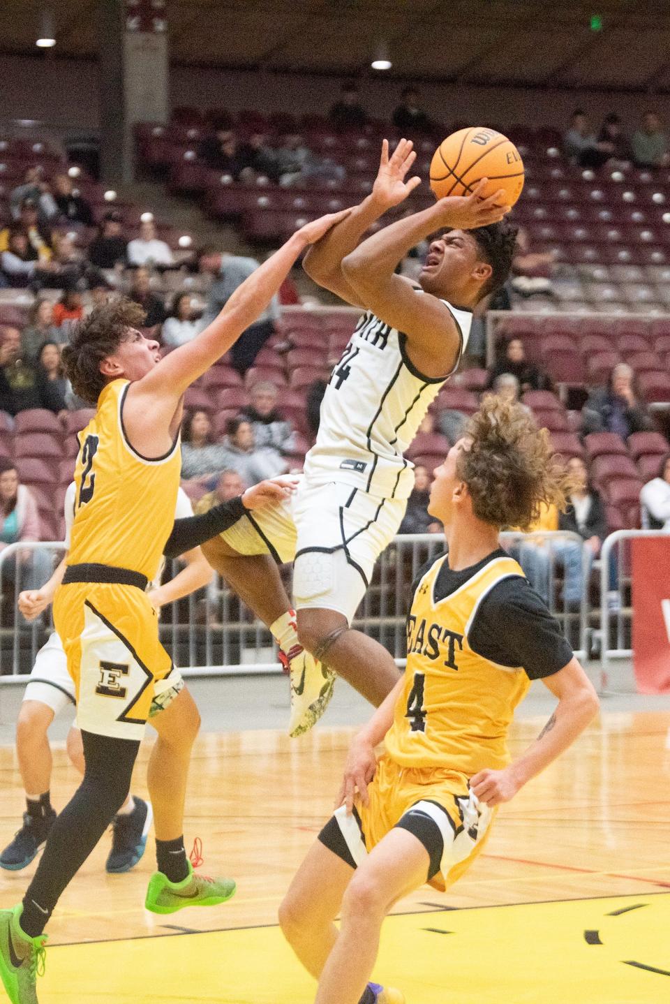Pueblo South's Maurice Austin shoots for two during a game against Pueblo East at the Southwest Motors Event Center on Thursday, February 2, 2024.